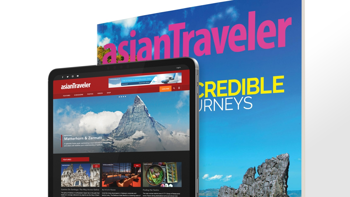 A print copy of an issue of Asian Traveler magazine alongside with an iPad displaying the Asian Traveler website